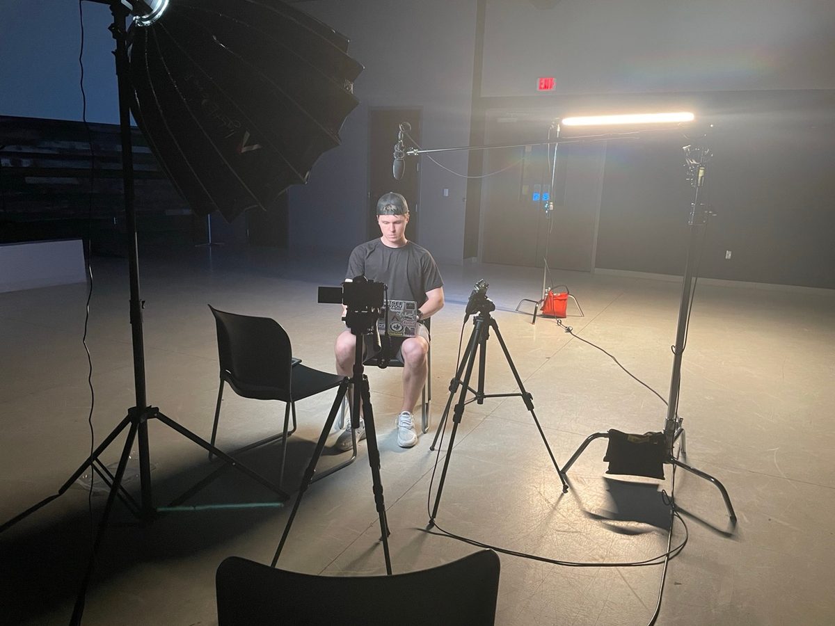 Jake Hill in studio working on Better Church Video course